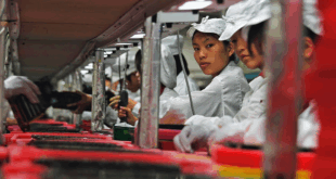 Trabajadores chinas en un fábrica.